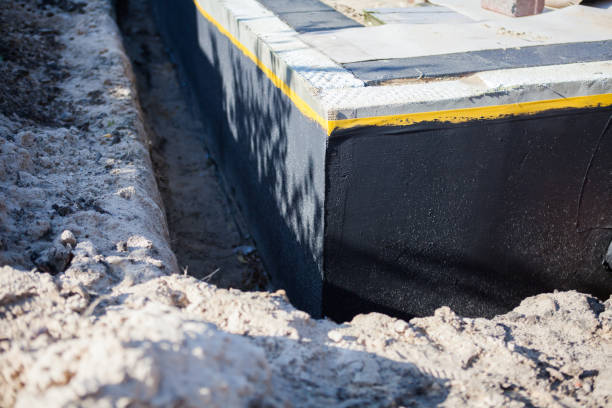 Professional Waterproofing technician working in Eva, AL